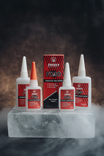 Technician applying Teraxo industrial adhesive between metal and plastic parts strong bonding and quality assurance